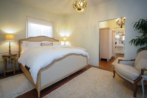 Rest in comfort on a BeautyRest Black Mattress with featherbed topper