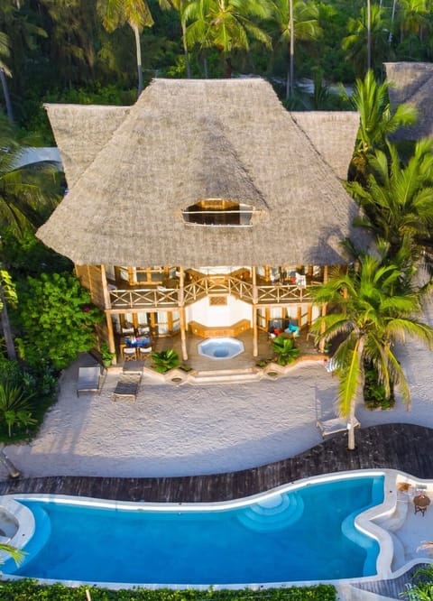Luxury Villa, 4 Bedrooms, Ocean View, Beachfront | Minibar, in-room safe, desk, blackout drapes