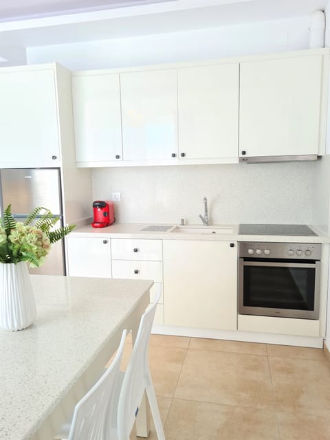 Deluxe Apartment, 1 Bedroom, Terrace, Sea Facing (Magnolia) | Private kitchen | Full-size fridge, oven, stovetop, espresso maker