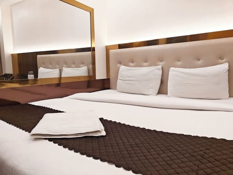 Deluxe Room non AC with Complimentary Wi-Fi | 1 bedroom, desk, free WiFi, bed sheets
