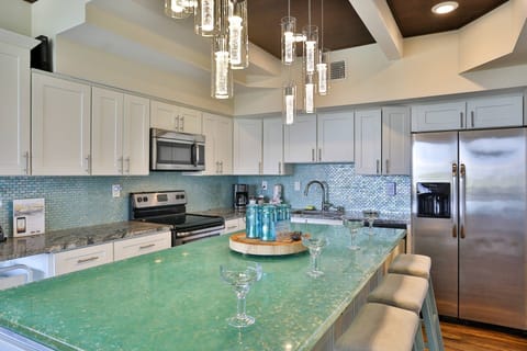 Fully Equipped Kitchen with Stainless appliances.  A starter kit with paper products and soap included.