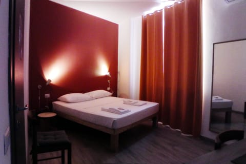 Economy Room, 1 Double Bed, Accessible, Private Bathroom | Down comforters, individually decorated, desk, blackout drapes