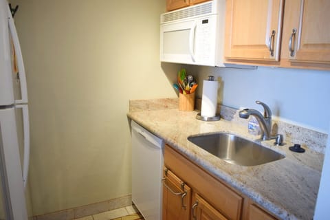 Enjoy cooking meals in your fully stocked kitchen