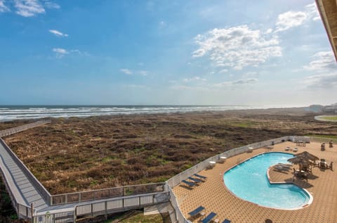 Pool & Ocean — Aerial View of Resort Pool, Boardwalk Through Dunes to Beach