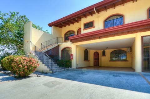 Front of condo with garage