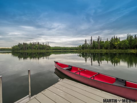 Life jackets and paddles can be found in the house.