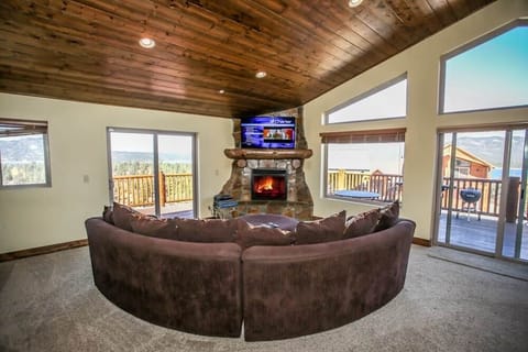 Beautiful fireplace, high definition television with cable.