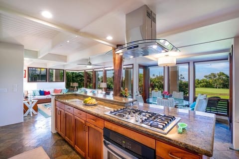 Prepare Meals with a Tropical Golf Course View - Floor to Ceiling Windows