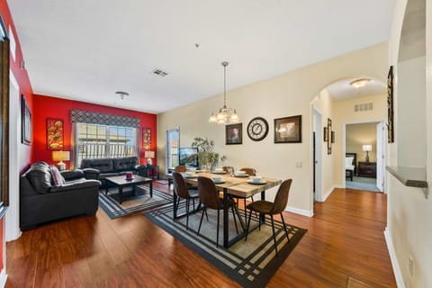 The open layout of the dining and living room is very ideal for a big group as it makes the room brighter and well-ventilated.