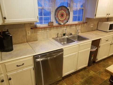 Kitchen Sink and counters.