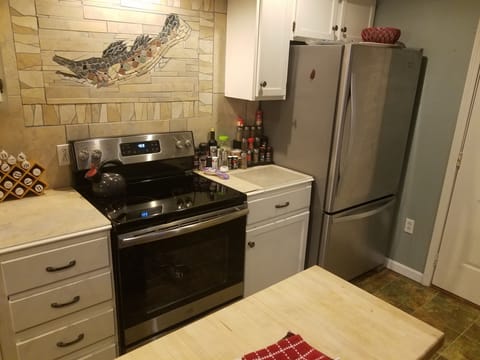 Kitchen stove and refrigerator. 