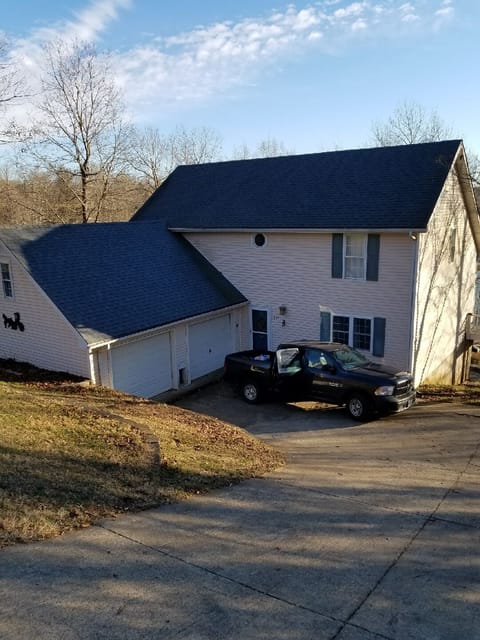 View of front of house from road.(steep driveway)
