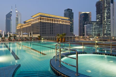 Outdoor pool, open 7:00 AM to 7:00 PM, pool umbrellas, sun loungers