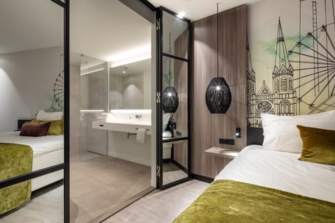 Separate tub and shower, rainfall showerhead, free toiletries