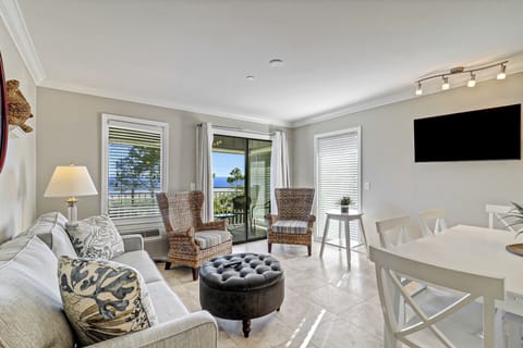 LivingRoom - Elegant interiors paired with unbeatable coastal charm in this stunning oceanfront unit.