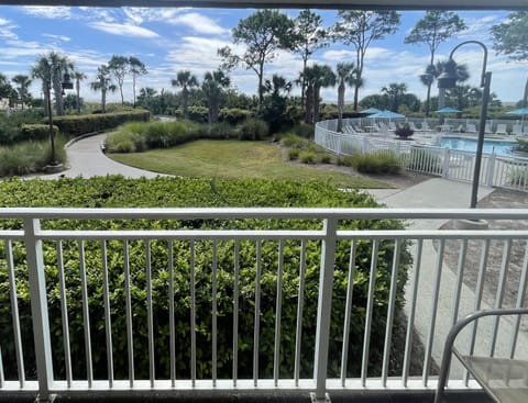 Pool and Ocean View Balcony - Beautiful, relaxing view from the the balcony.
