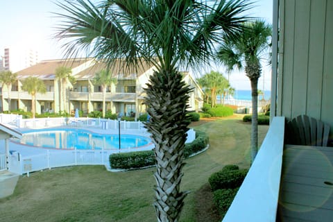 View from the deck of the pool and the gulf in the background.
