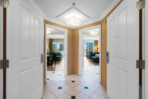 Entrance to the Penthouse suite. The Primary bedroom & living room are through the left door, the second primary bedroom (and bathroom) are through the right door. You can shut the main entrance door for extra foyer space.