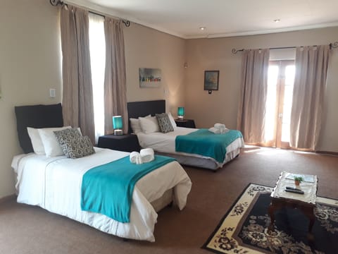 Family Room | 10 bedrooms, premium bedding, pillowtop beds, individually decorated