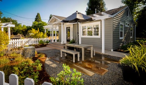 Beautiful outdoor eating with custom stone and zinc fountain