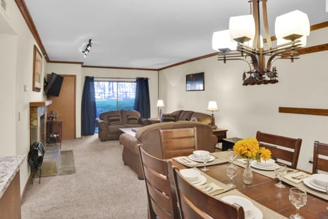 Park Station 214's dining room is open to the living room area.