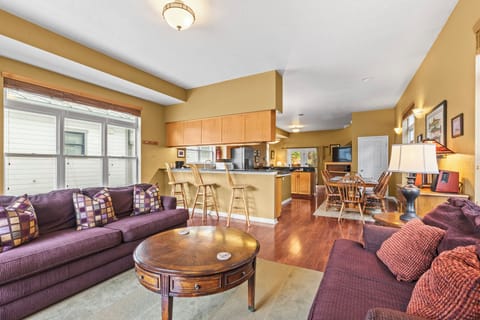 The living room offers comfortable couches to relax.