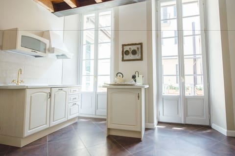 Deluxe Apartment, Balcony | Private kitchen | Coffee/tea maker