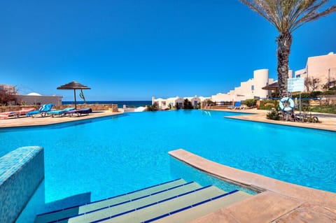 Go for a swim and relax round the infinity pool whilst gazing out to sea.