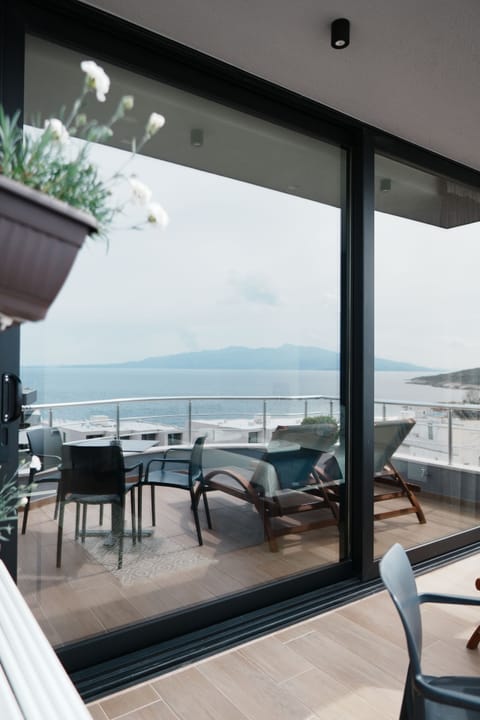 Deluxe Suite, Terrace, Sea View | Living area | Flat-screen TV