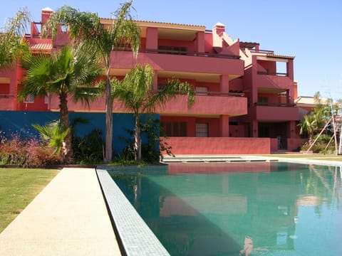 Large outdoor communal swimming pool in Arona complex