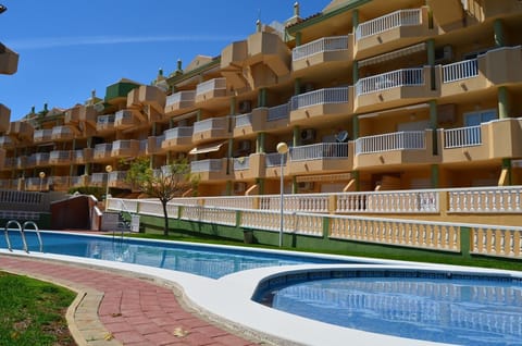 Exterior of Villas de Frente with swimming pool and gardens