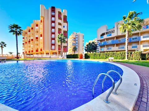 Spacious La Manga apartment balcony overlooking the marina, Mediterranean Sea, and Mar Menor lagoon.