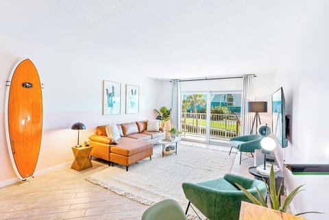 Vibrant living room with a surf-inspired theme and a cozy seating area