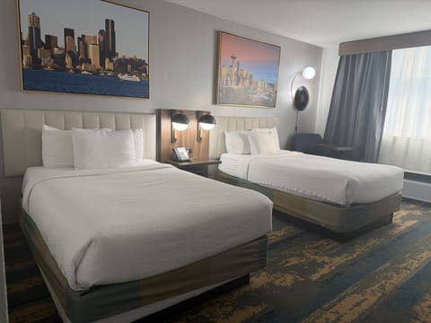 Premium bedding, pillowtop beds, desk, blackout drapes