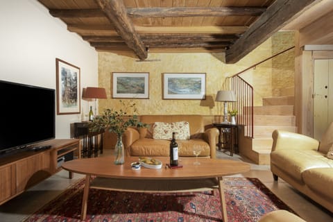 Relax in the comfort of the sitting room with comfy seating