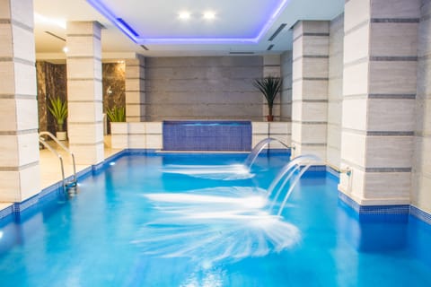 Indoor pool, open 9 AM to 10 PM, sun loungers