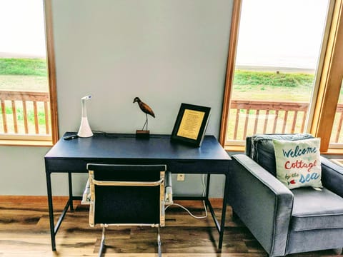 Desk, comfy chair, and LED light to work or study on private 3rd floor