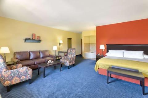 Blackout drapes, soundproofing, iron/ironing board, rollaway beds