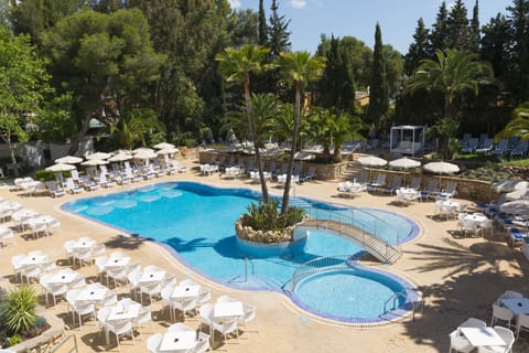 Outdoor pool, open 10:00 AM to 6:00 PM, pool umbrellas, sun loungers