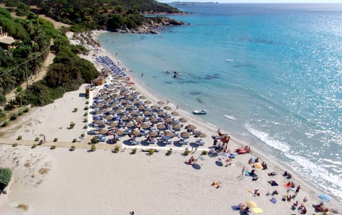 Private beach, white sand, sun loungers, beach umbrellas