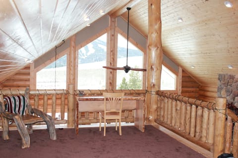 view of loft & desk.
