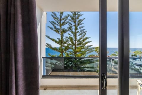 Superior Triple Room, Sea View | Minibar, in-room safe, iron/ironing board, free WiFi