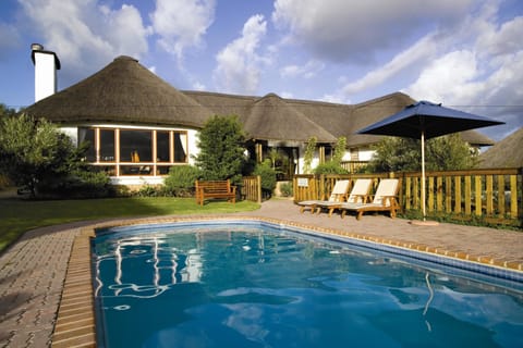 Outdoor pool, open 7:00 AM to 7:00 PM, sun loungers