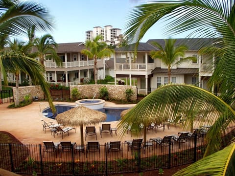 Luxury resort pool view from the master bedroom lanai of our Hawaii condominium