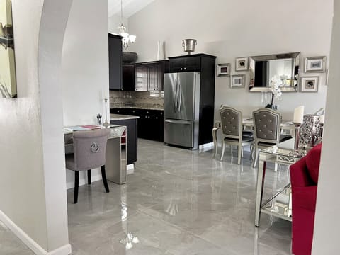 The open concept living, dining, and study areas. 