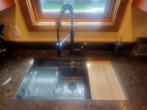 New Deep Sink with built in veggie washing and chopping board station.