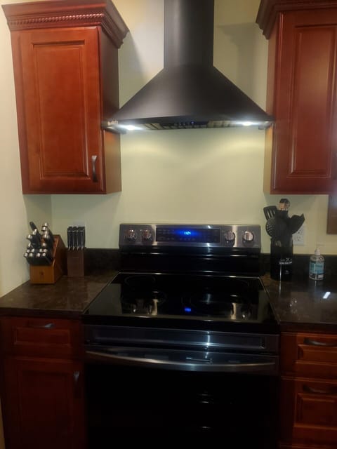 Flat Top Stove, Oven (Convection & Self Cleaning) w/exhaust hood.