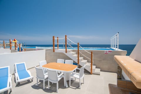 Outdoor Area; Table, Chairs and Sun Loungers
