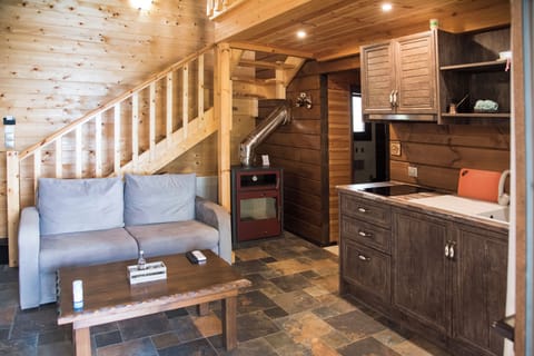 The Farmwood Cottage - 2 Bedroom Villa with Sauna & Shared Pool | Living room | Flat-screen TV