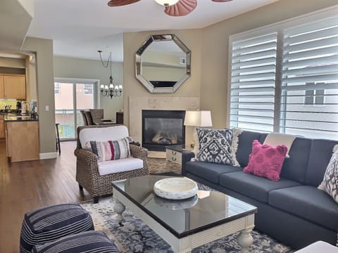 Fresh and bright new living room attire. Sofa makes into a KING memory foam bed.